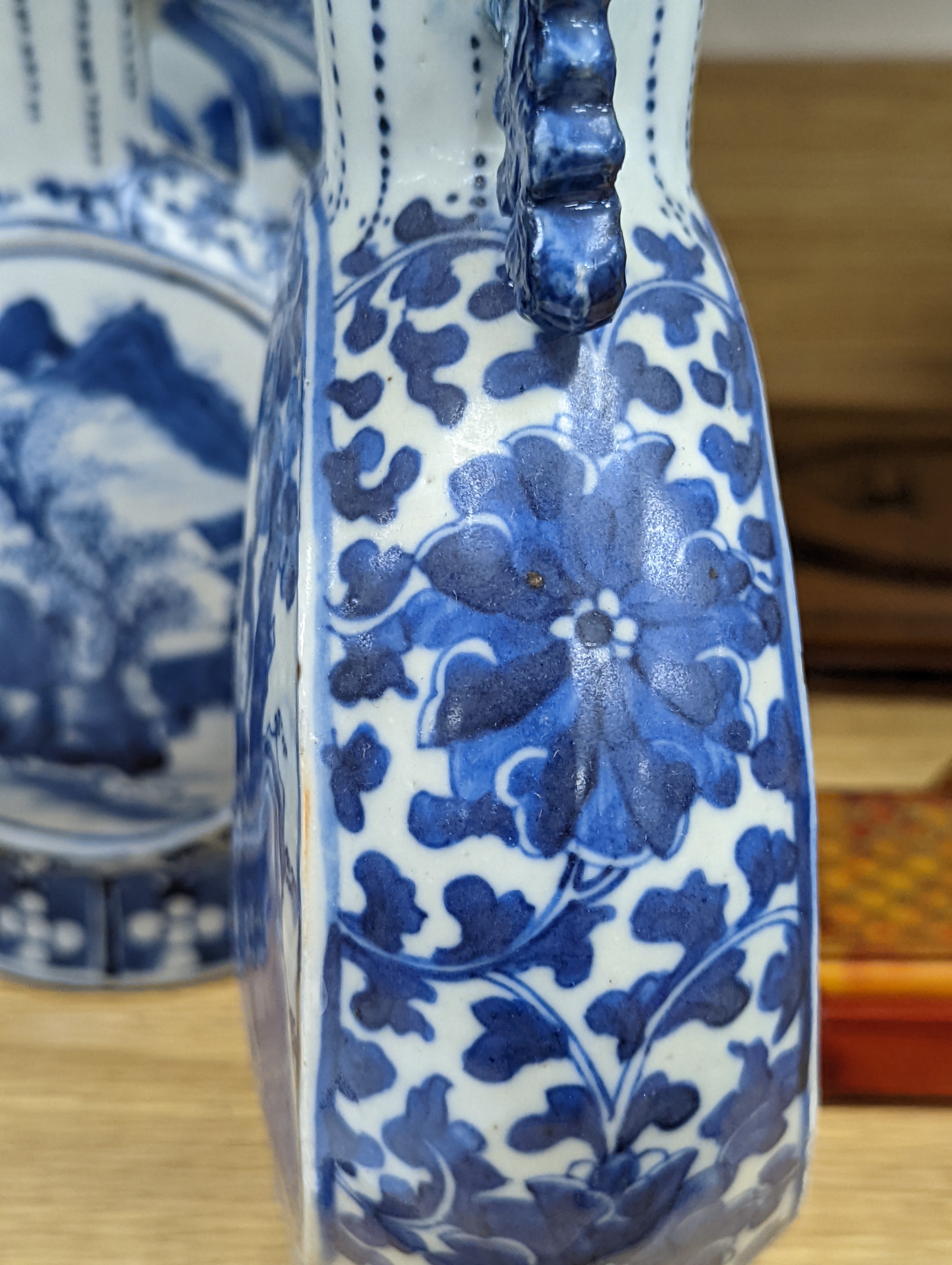 Three 19th century Chinese blue and white Moon flasks, tallest 31 cms.